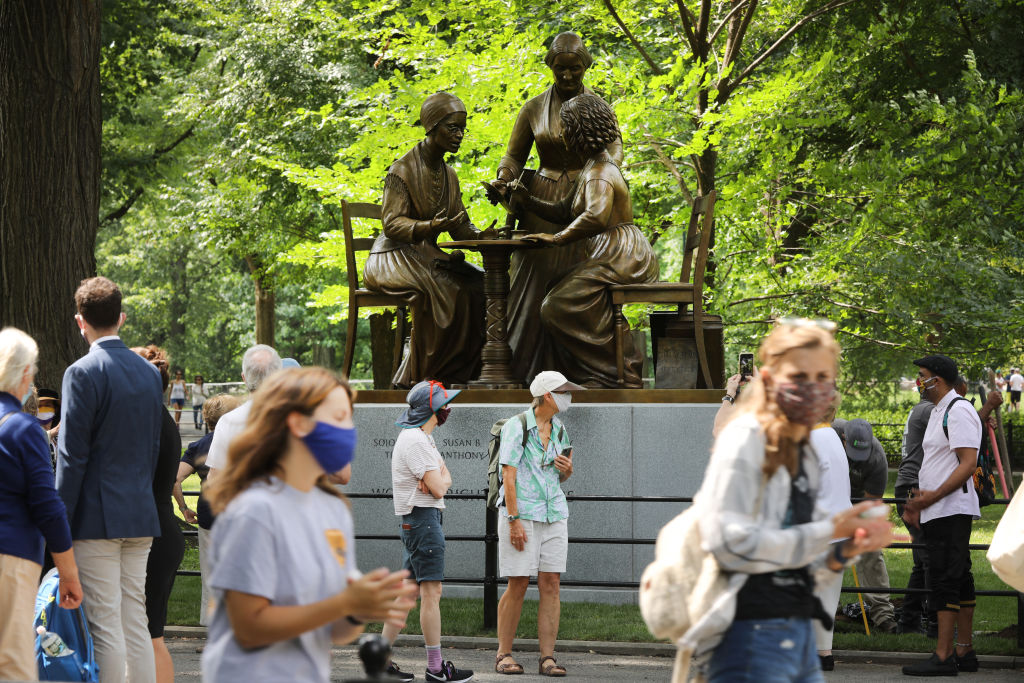 NEW YORK, NEW YORK - AUGUST 26: People attend the unveiling of a new statue of women's rights pioneers Sojourner Truth, Susan B Anthony, and Elizabeth Cady Stanton at Central Park (Photo by Spencer Platt/Getty Images)
