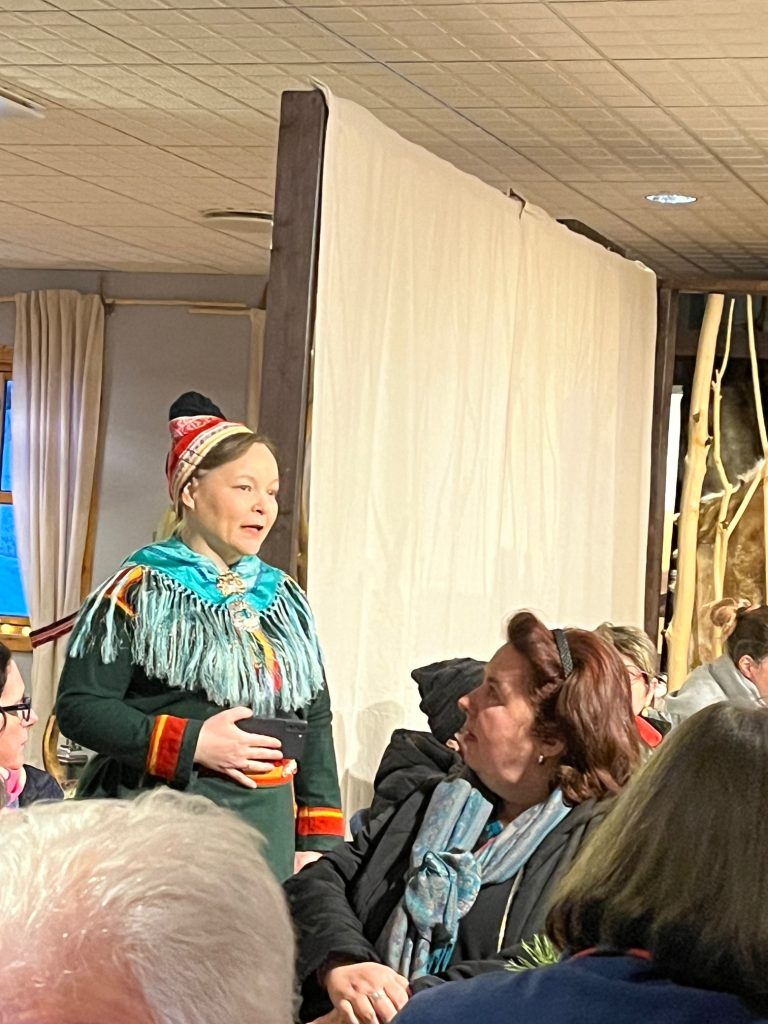 Maret Bujio explaining Sami Peoples' culture and food traditions