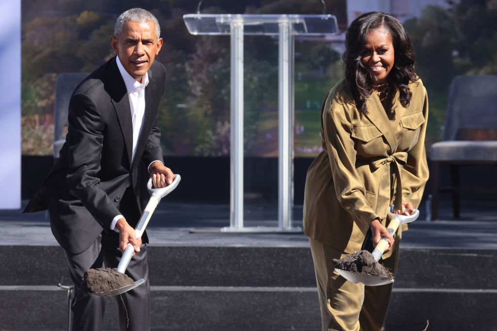CHICAGO, ILLINOIS - SEPTEMBER 28: Former U.S. President Barack Obama and former first lady Michelle Obama participate in a ceremonial groundbreaking at the Obama Presidential Center in Jackson Park on September 28, 2021 in Chicago, Illinois. Construction of the center was delayed by a long legal battle undertaken by residents who objected to the center being built in a city park.   (Photo by Scott Olson/Getty Images)