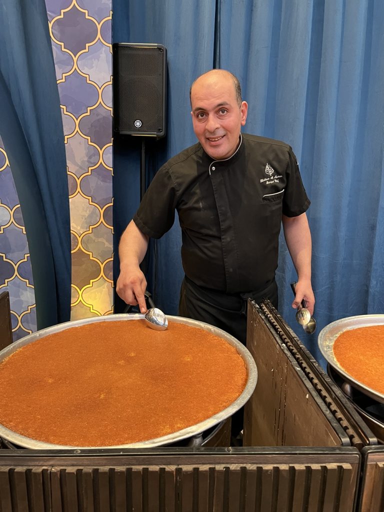 Four Seasons Hotel Amman Top Chef Khaldour AL Momeni serves dessert