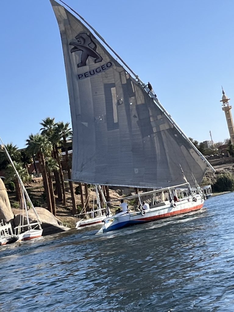 A felucca boat sailing on the Nile just like they have for thousands of years