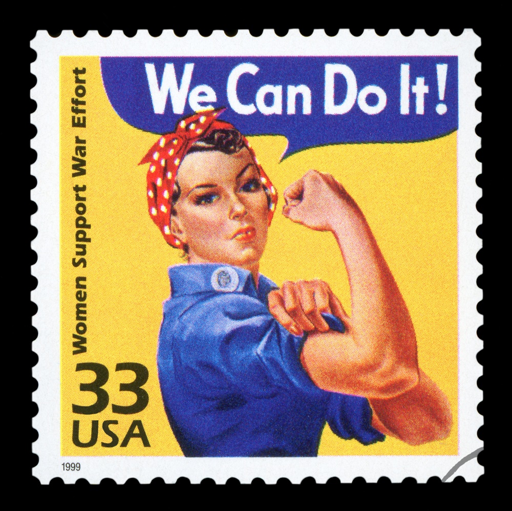 Canceled US Postage stamp showing an image of Rosie The Riveter
