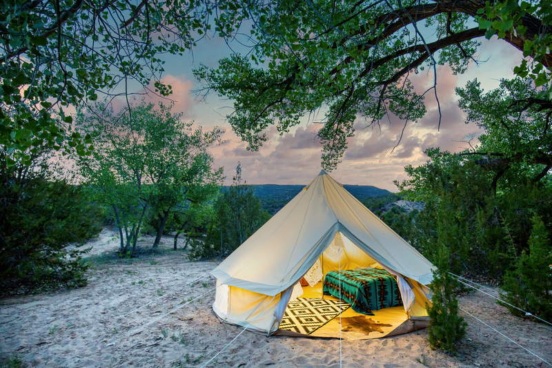 Glamping Tent Site in a Desert Sunset. 