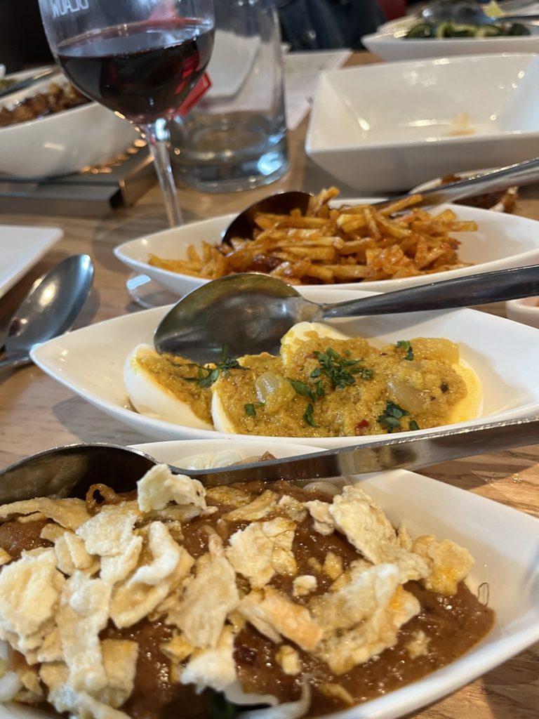 Delicious Indonesian rice table feast at Restaurant Blauw in Amsterdam