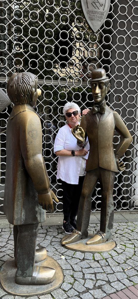 Statues of popular puppets outside historic theater in Cologne Gernany