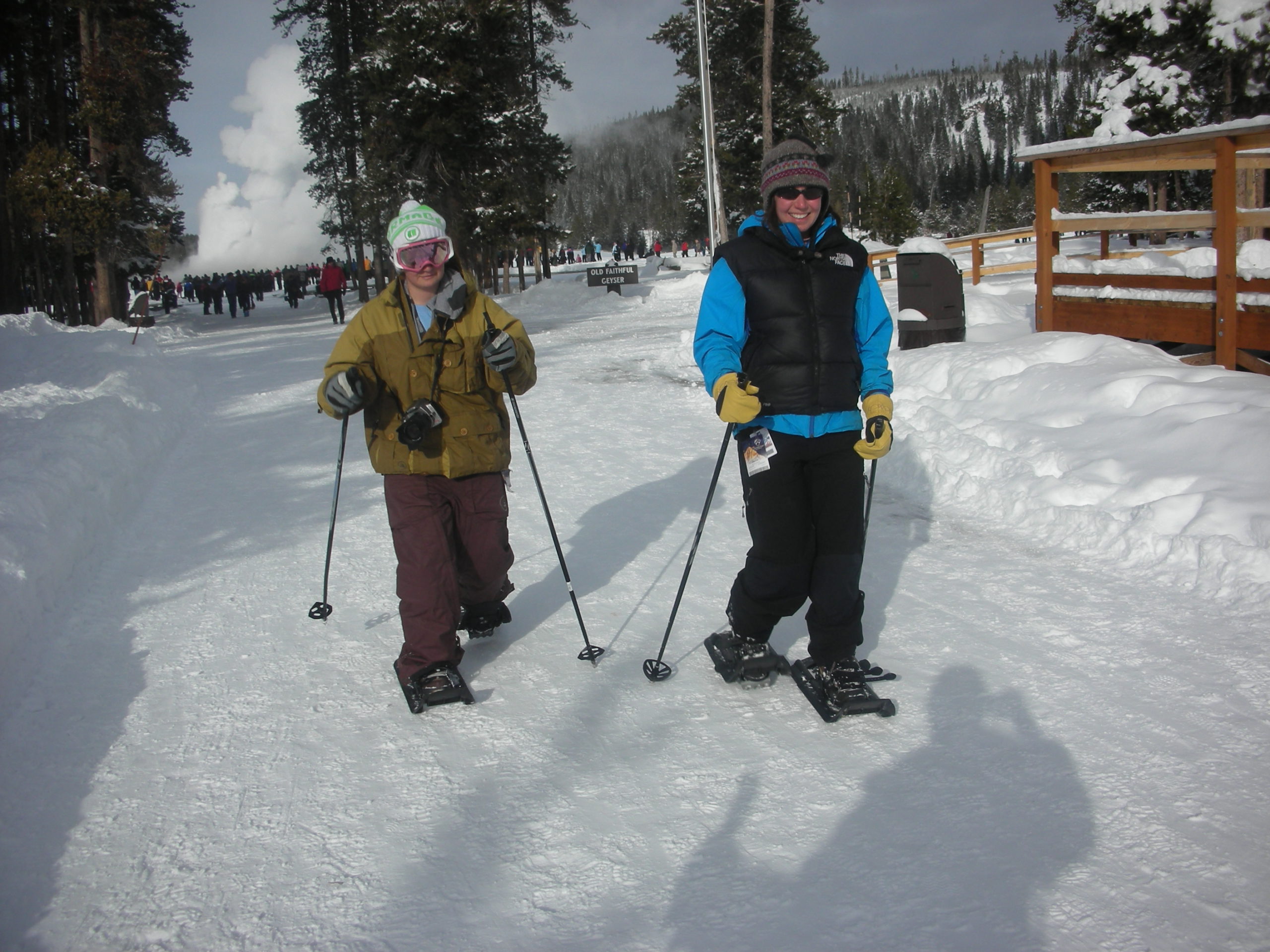 Mel and Reggie snowshoeing near Old Faithful