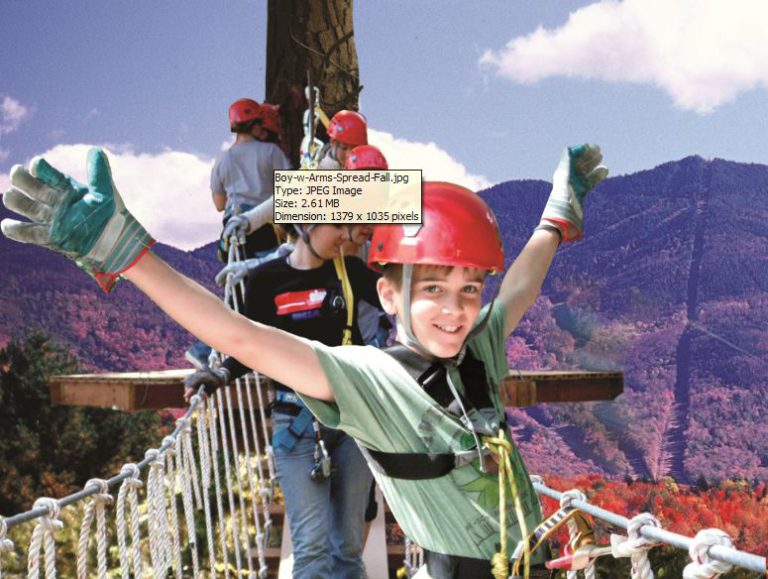 Kids and grownups zipping through the treetops in Northern Vermont