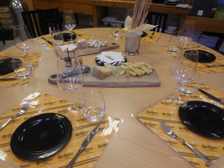 Aging cheese, lots of cheese, at a special artisan shop in Italy