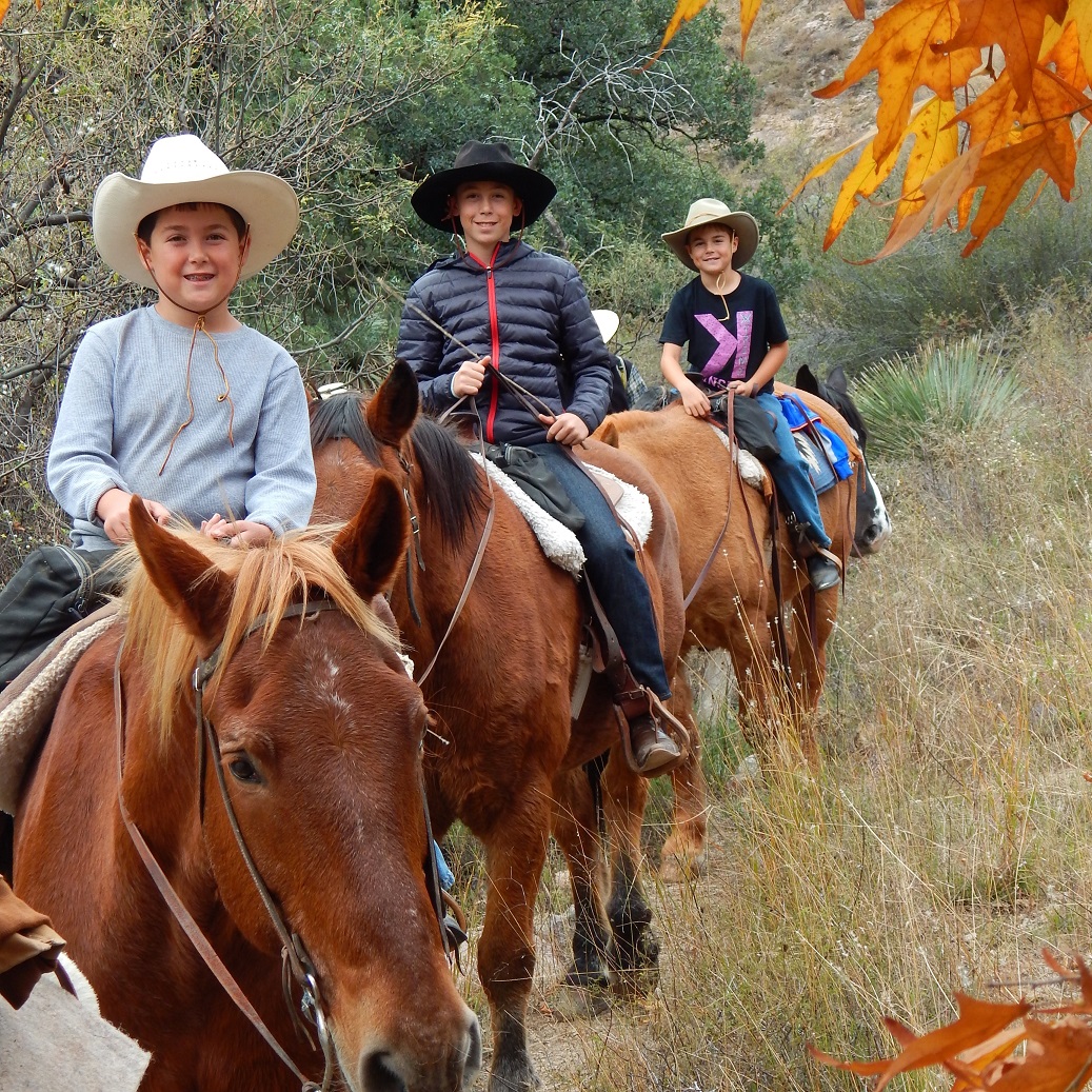 Kids riding at Elkhorn Ranch during the Thanksgiving holiday