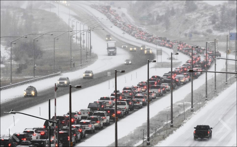 Often typical weekend traffic on I-70 heading west from Denver to ski country (Denver Post photo)