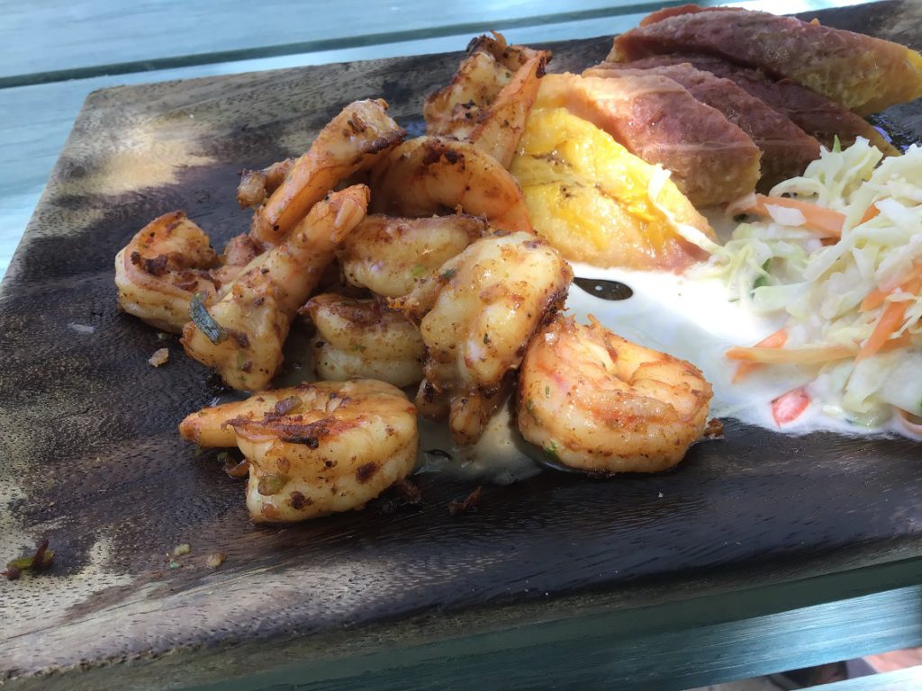 Grilled shrimp, slaw and roasted plantains for lunch on Button Beach