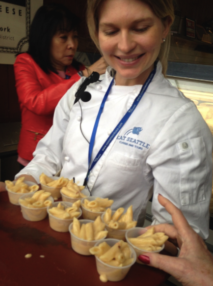 Elizabeth McClure with samples of Beechers mac and cheese