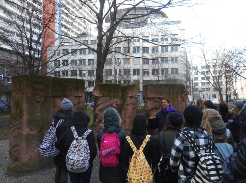 A group of Israeli schoolchildren visit the monument to the women who saved their Jewish husbands