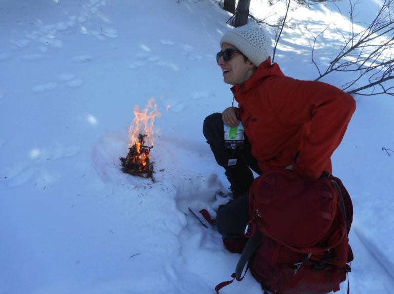 Ben Martin shows how to start an emergency fire on snowshoe trek