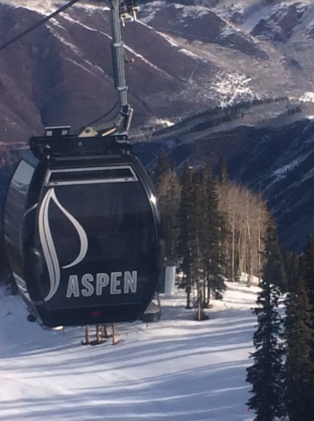 Riding the Silver Queen Gondola to first tracks on Aspen Mountain