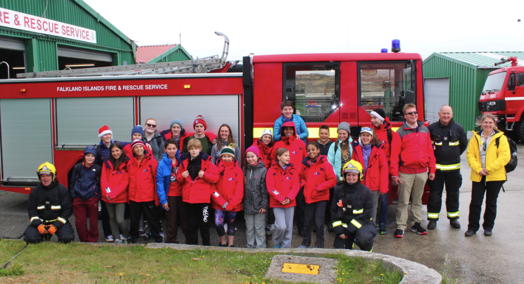 Kids from A&K cruise at Falkland Islands Fire House