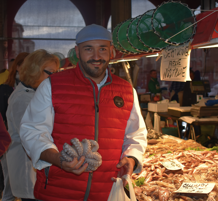 Chef Bogdan of Uniworld River Countess buys octopus in Rialto Market