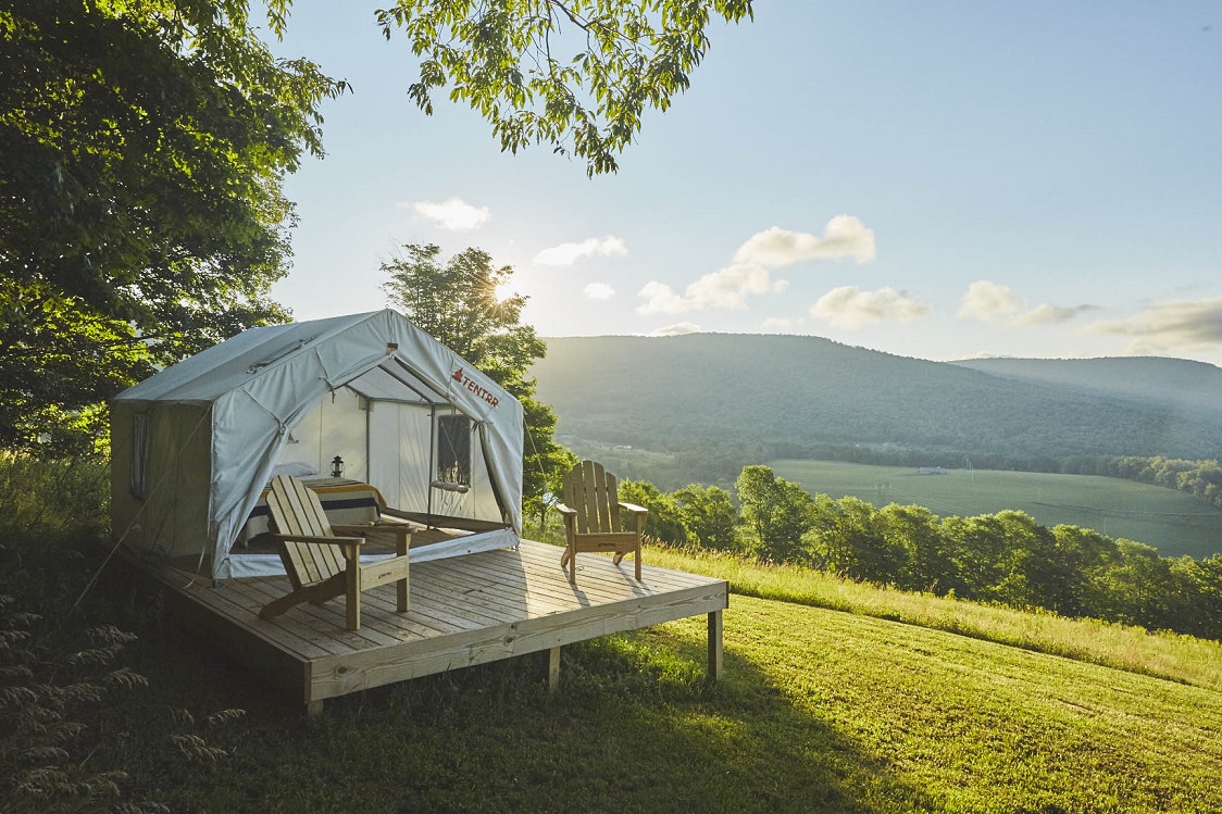 Tentrr.com offers secluded campsites, complete with an already set-up platform tent, bed, wood stove, fire pit, even camp toilet and table and grill