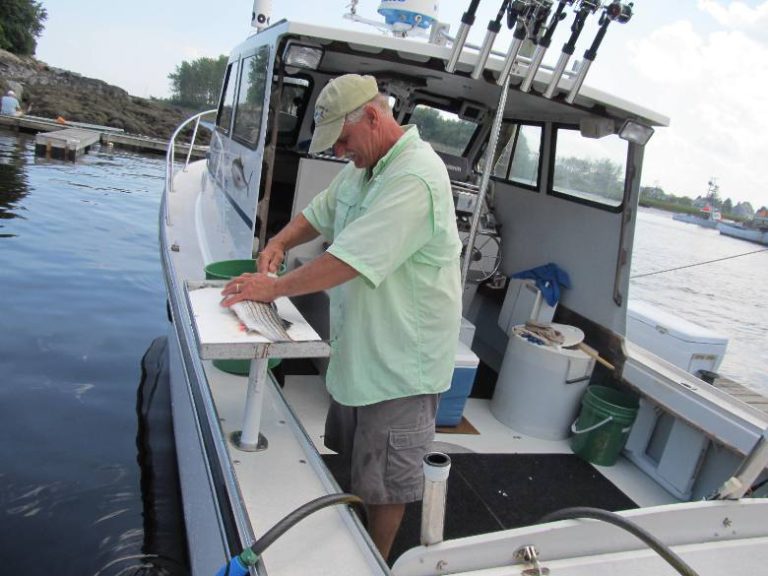 Teaching a kid to fish with a “Wicked Tuna” star in Kennebunkport ME