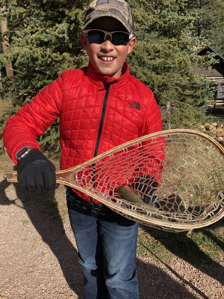 10 year-old Owen McMahon proudly shows his catch