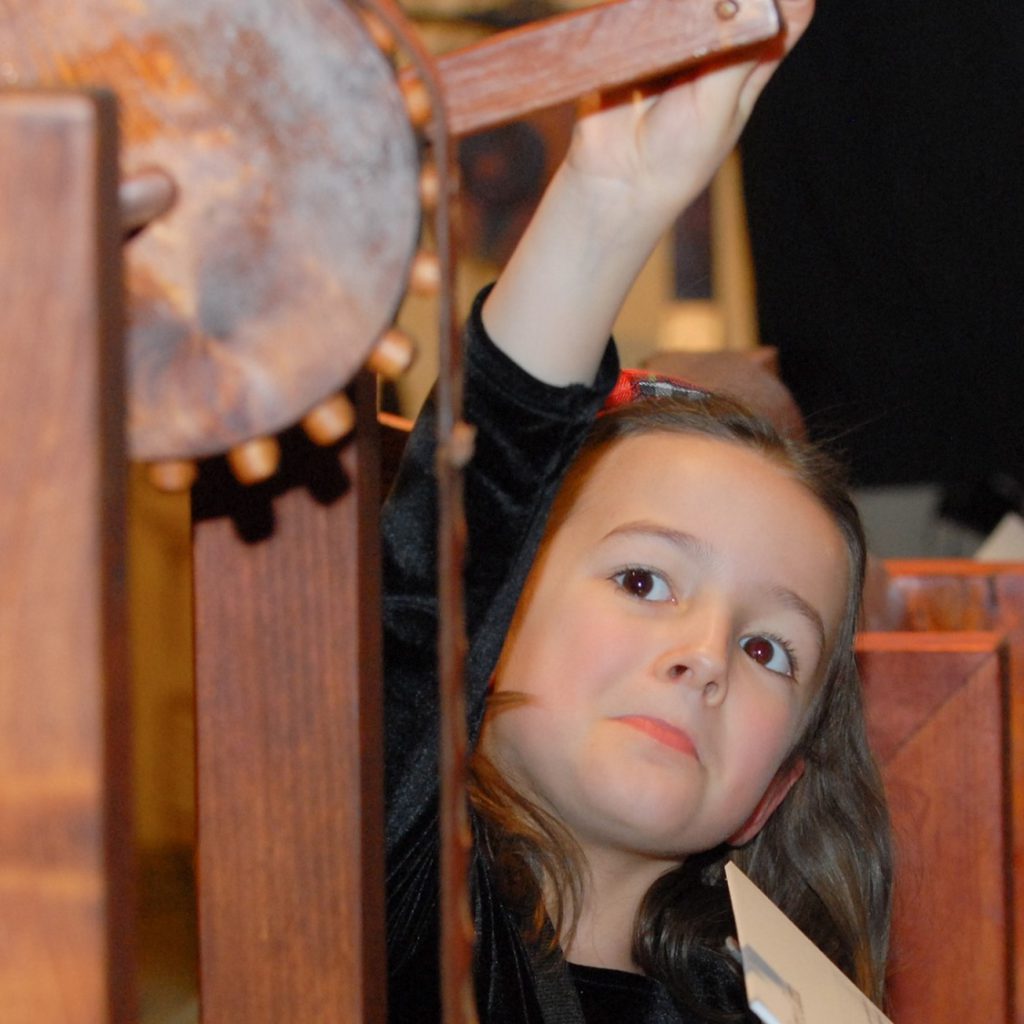 A young visitor investigates one of the many machines inspired by Leonardo’s study of mechanical principles