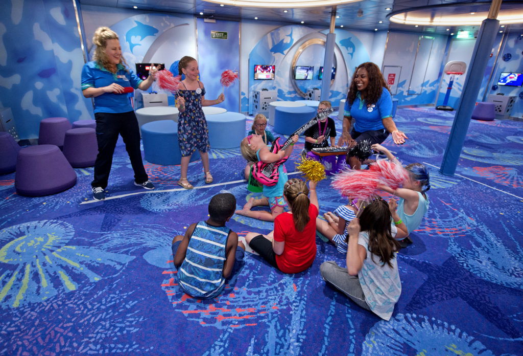 Young cruisers rock out with youth counselors in Camp Ocean aboard the Carnival Sunrise