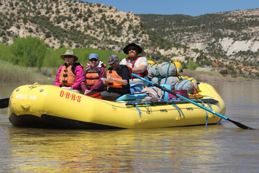 Eileen Ogintz takes notes as our group leader Kyle Waller leads the expedition down the Yampa River