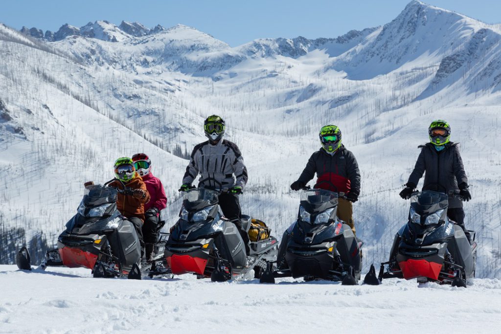 Our group on snowmobiles in the back country near Vista Verde Ranch