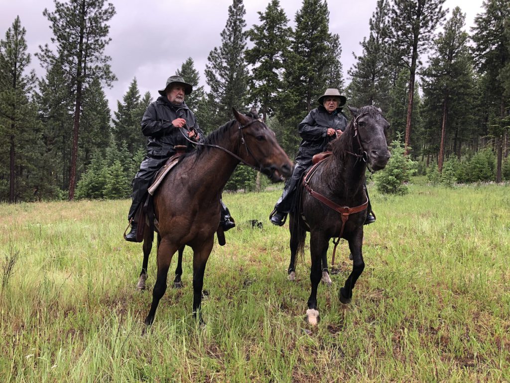 Our horseback ride in the rain at Paws Up