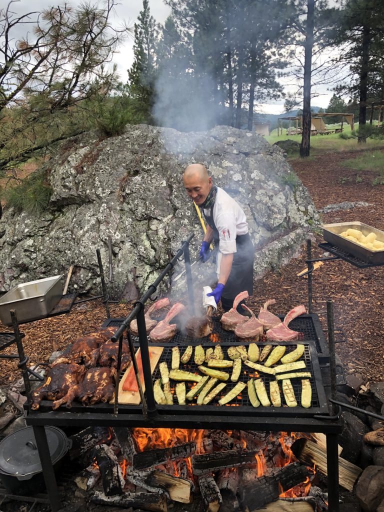 Paws Up Executive Chef Sunny Gin prepares Chuck Wagon dinner feast