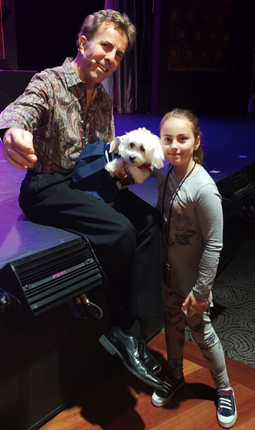 Jeff Peterson, his dog and Alexandra in the ship's theater