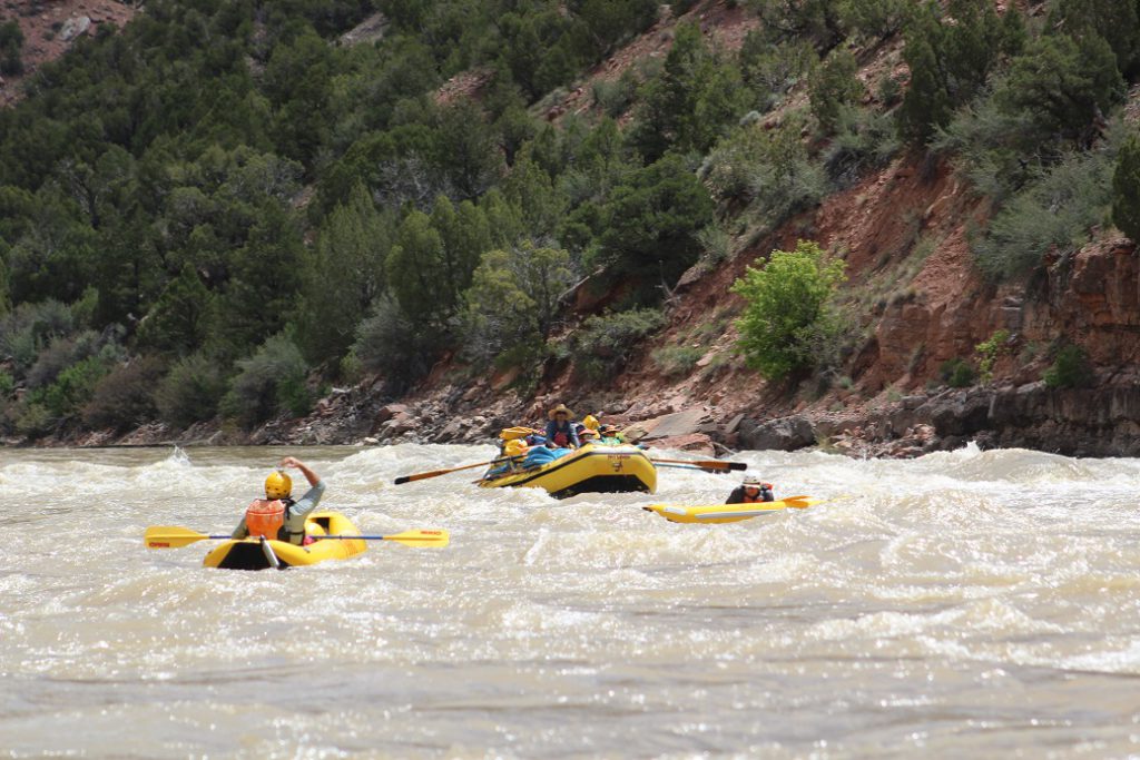 Two 'duckies' (inflatable kayaks attacking some class 2.5 rapids