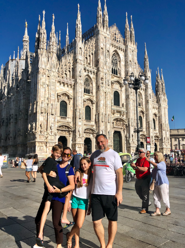 You can't leave Milan without a family photo near the Duomo di Milano