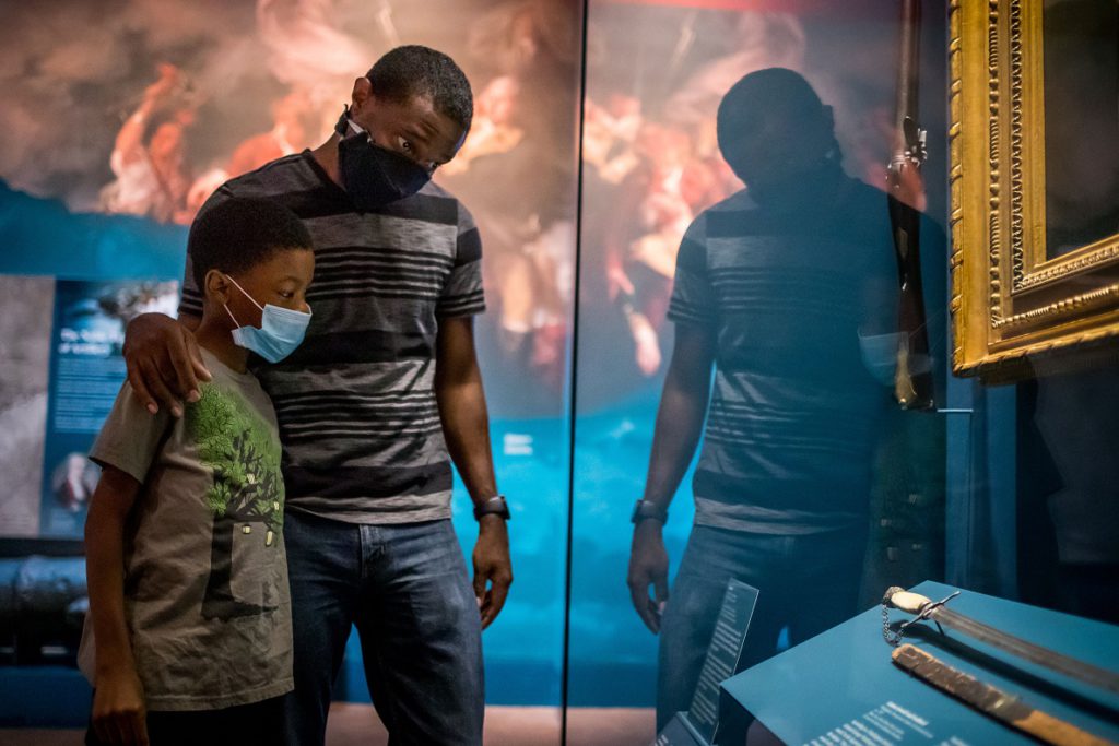 Museum goers safely navigating displays as AMR reopens. (Museum of the American Revolution)