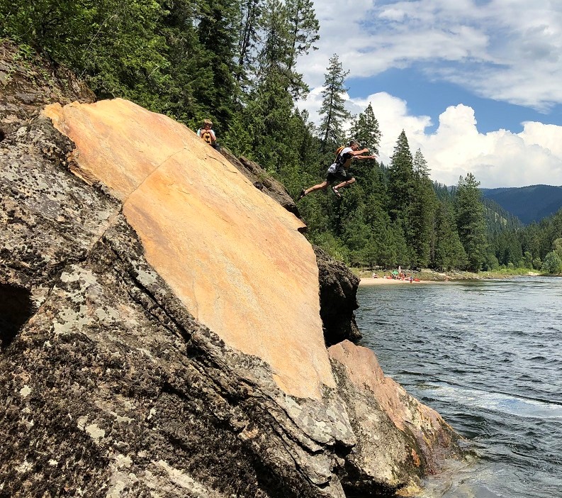 Dan Casler jumps while Jack studies technique