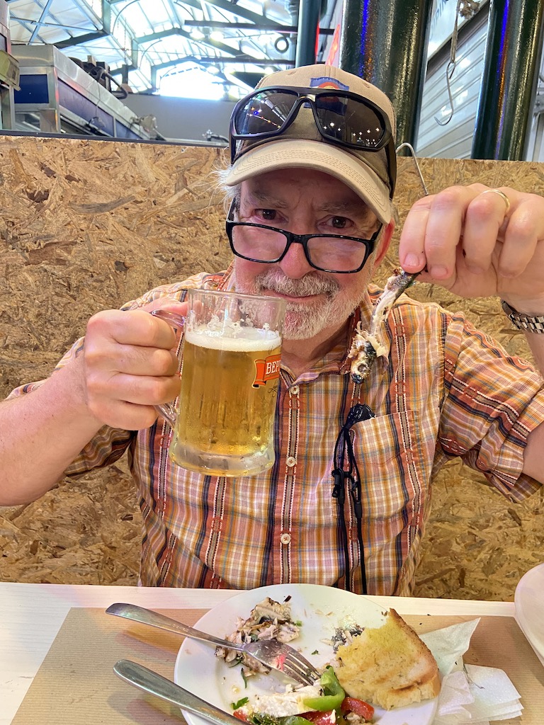 Enjoying grilled Sardines and beer at Maxitopa in Athens Central Market