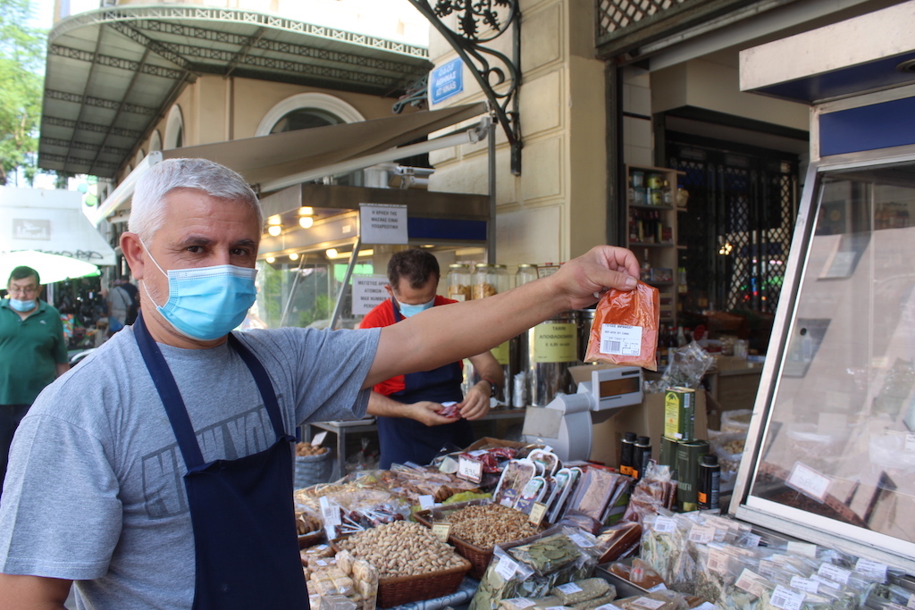 Vendor selling spices at Central Market in Athens