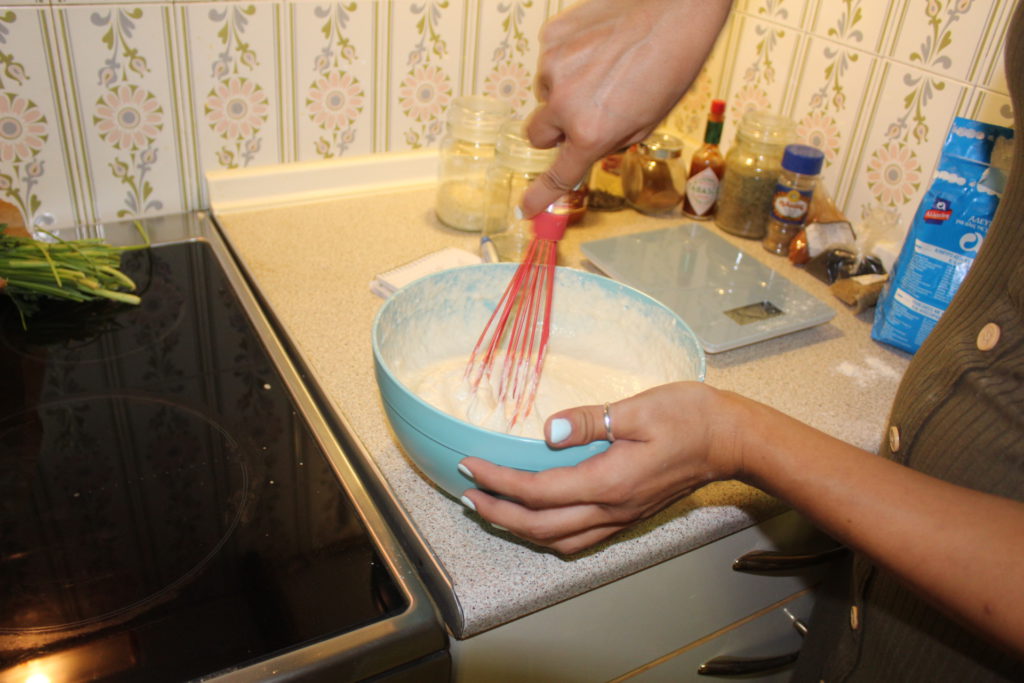 Whisking the dessert donut dough