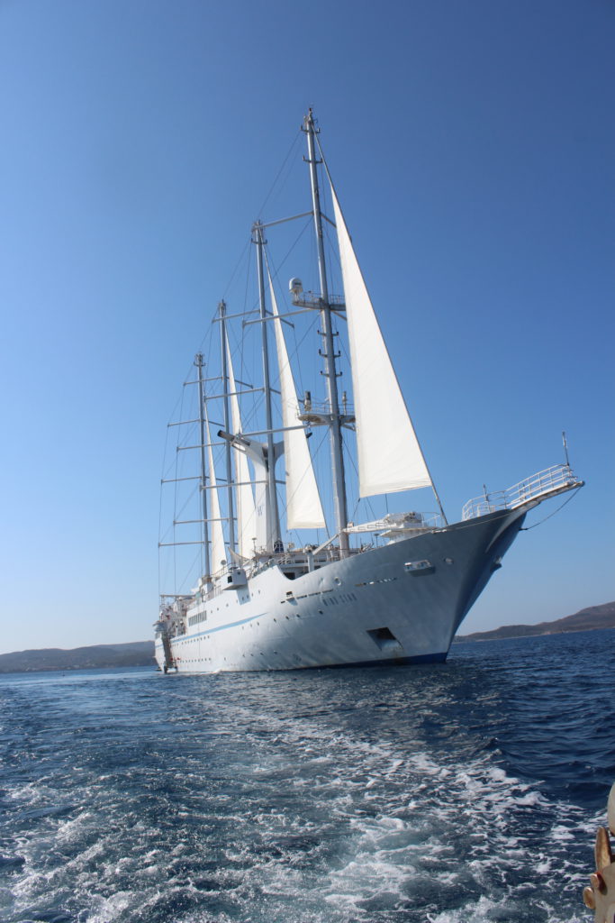 The Wind Star anchored in the harbor of Milos