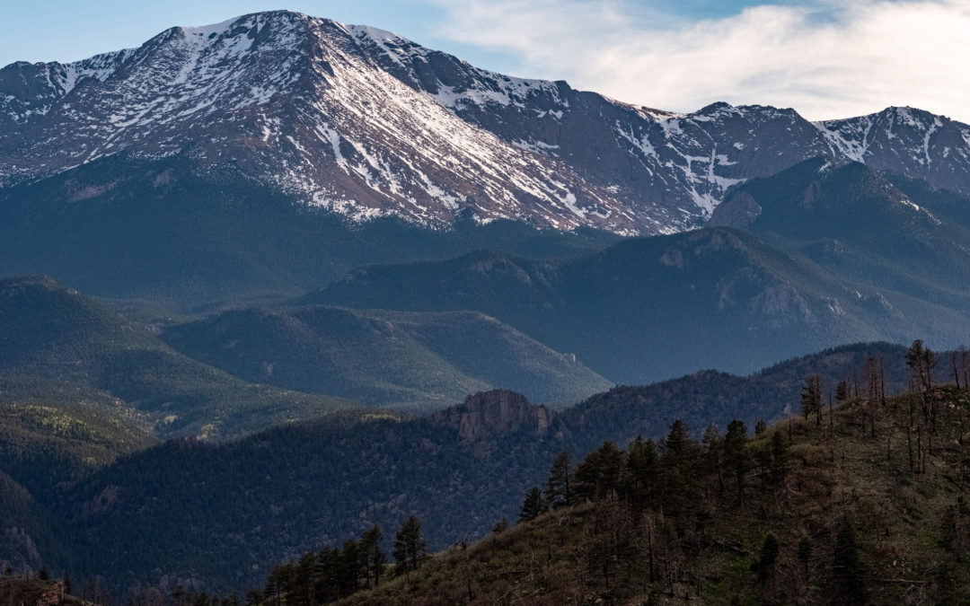 Pikes Peak mountain range seen from rampart range road in Colorado Springs during the summer.