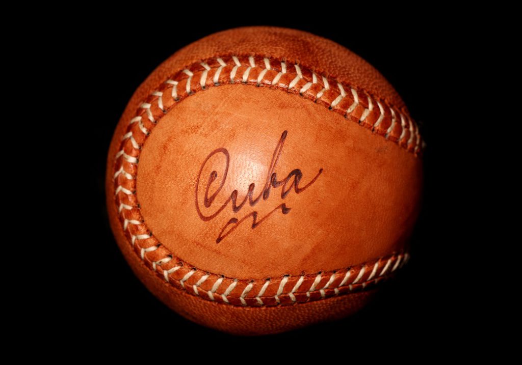 Vintage style cuban baseball on black background