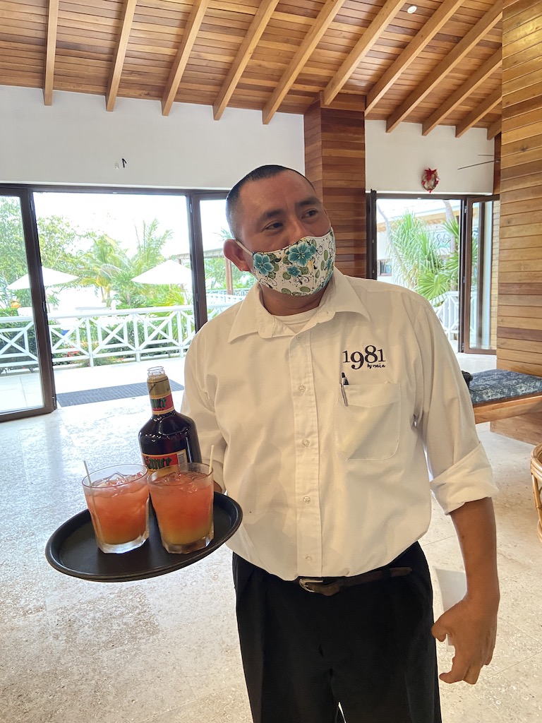Arriving guests are treated to refreshing drinks at Naia Resort & Spa