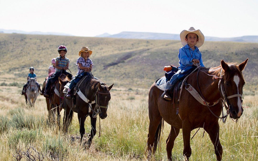 Children enjoy ranch activities at the Lazy L & B Ranch, Dubois, Wyoming