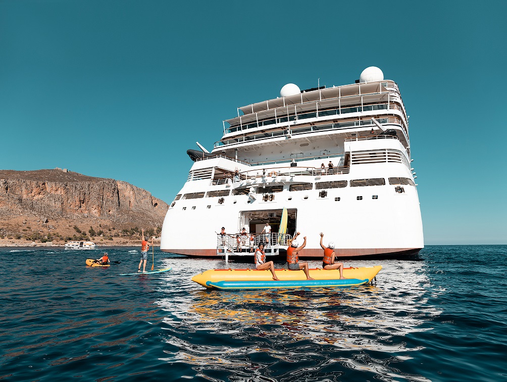 Kayaking from the aft of a Seabourn Yacht