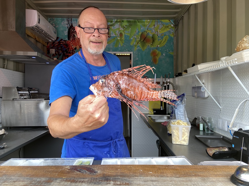 Lionfish and chips served at the Bario Hotel food court