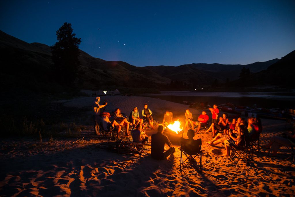 Campfire fun on a ROW Adventures family rafting trip