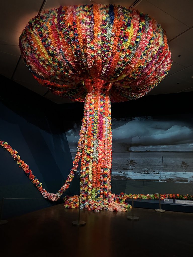 Mushroom cloud made of synthetic leis in the newly reopened Oceana Art gallery