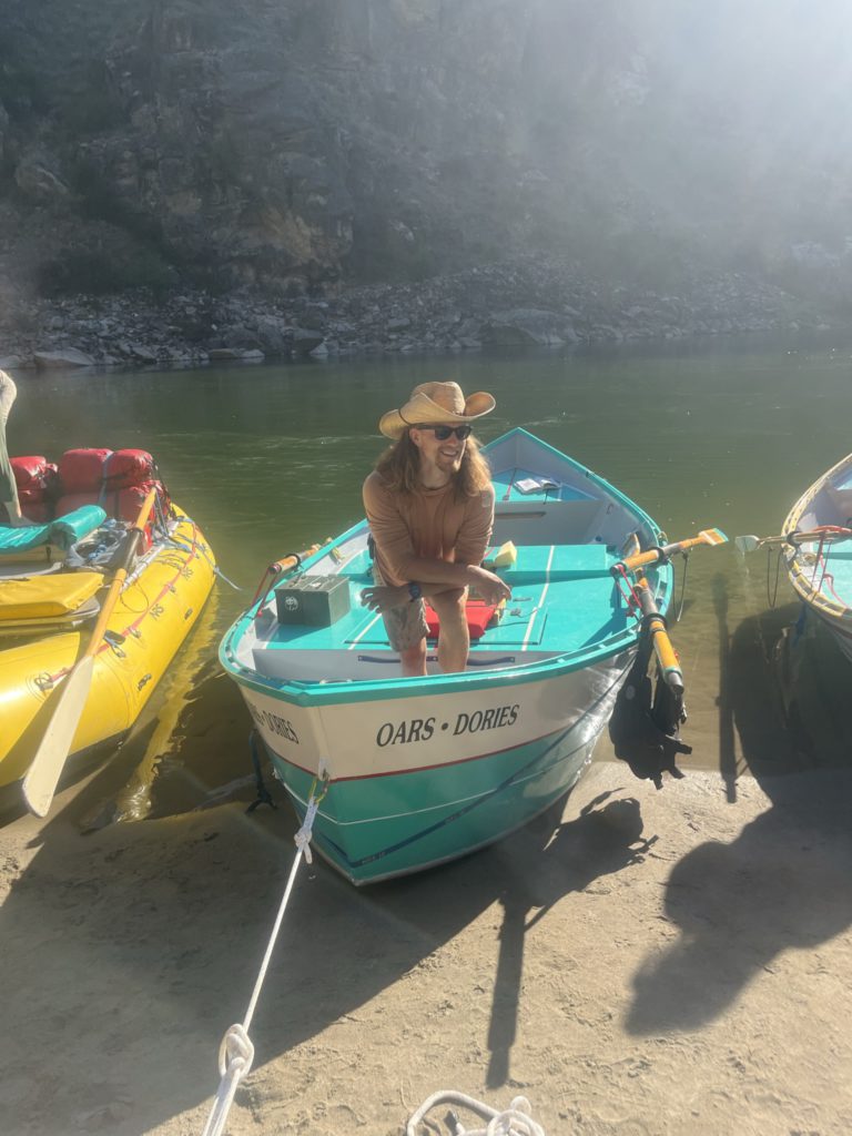 OAR Guide Ethan Nelson in the aluminum dory boat on Main Salmon River