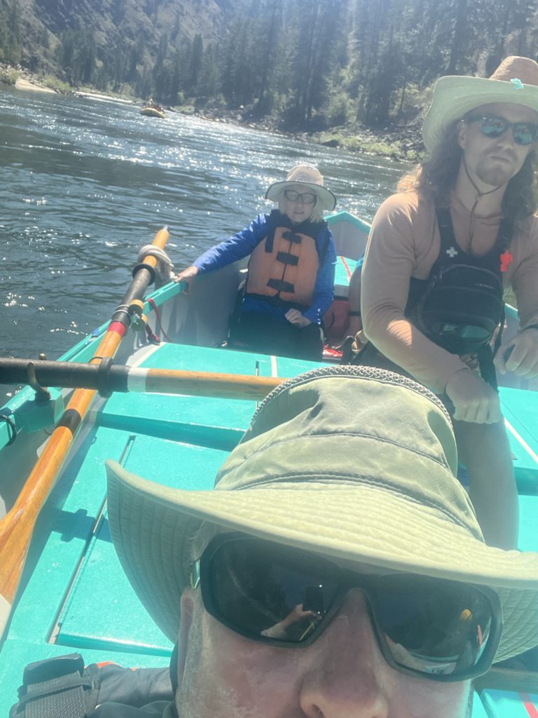 Ethan Nelson rows the aluminum dory down the Main Salmon River