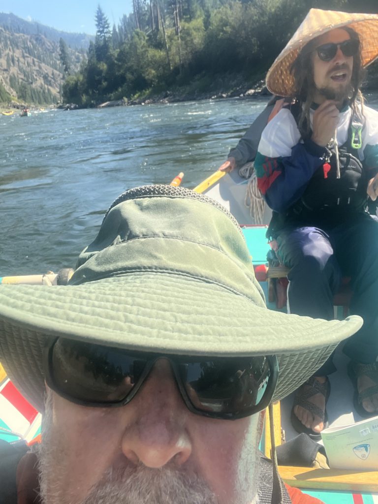 OARS rafting trip leader Kale Cimperman in his dory